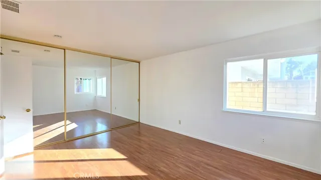 a view of livingroom with hardwood floor and window