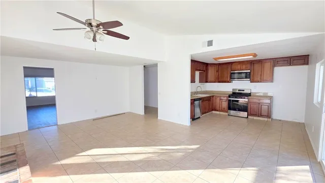 a view interior of a house and kitchen space with wooden floor