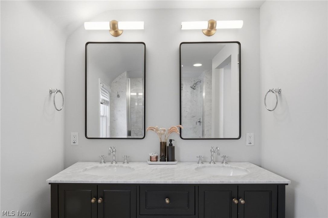 1390 Brainard Road Lyndhurst, OH 44124 - Photo 23 of 33 Full bathroom with double vanity and a shower