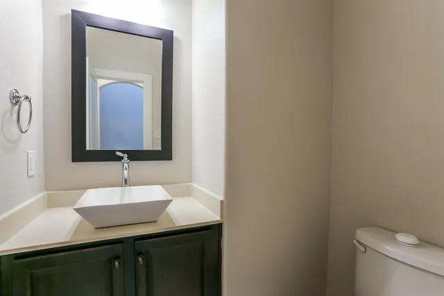 a bathroom with a sink and a toilet