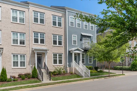 a front view of a building with street view