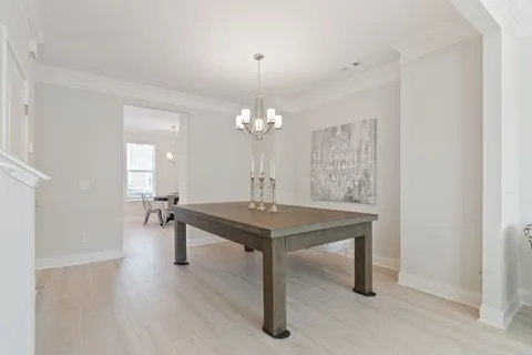 a living room with furniture and window