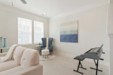 a dining room with a table and chairs