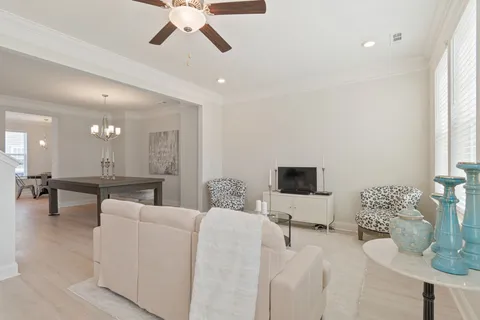 a kitchen with stainless steel appliances a stove microwave and sink
