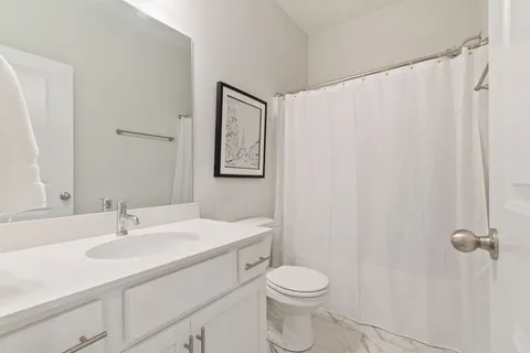 a view of dining room with chandelier
