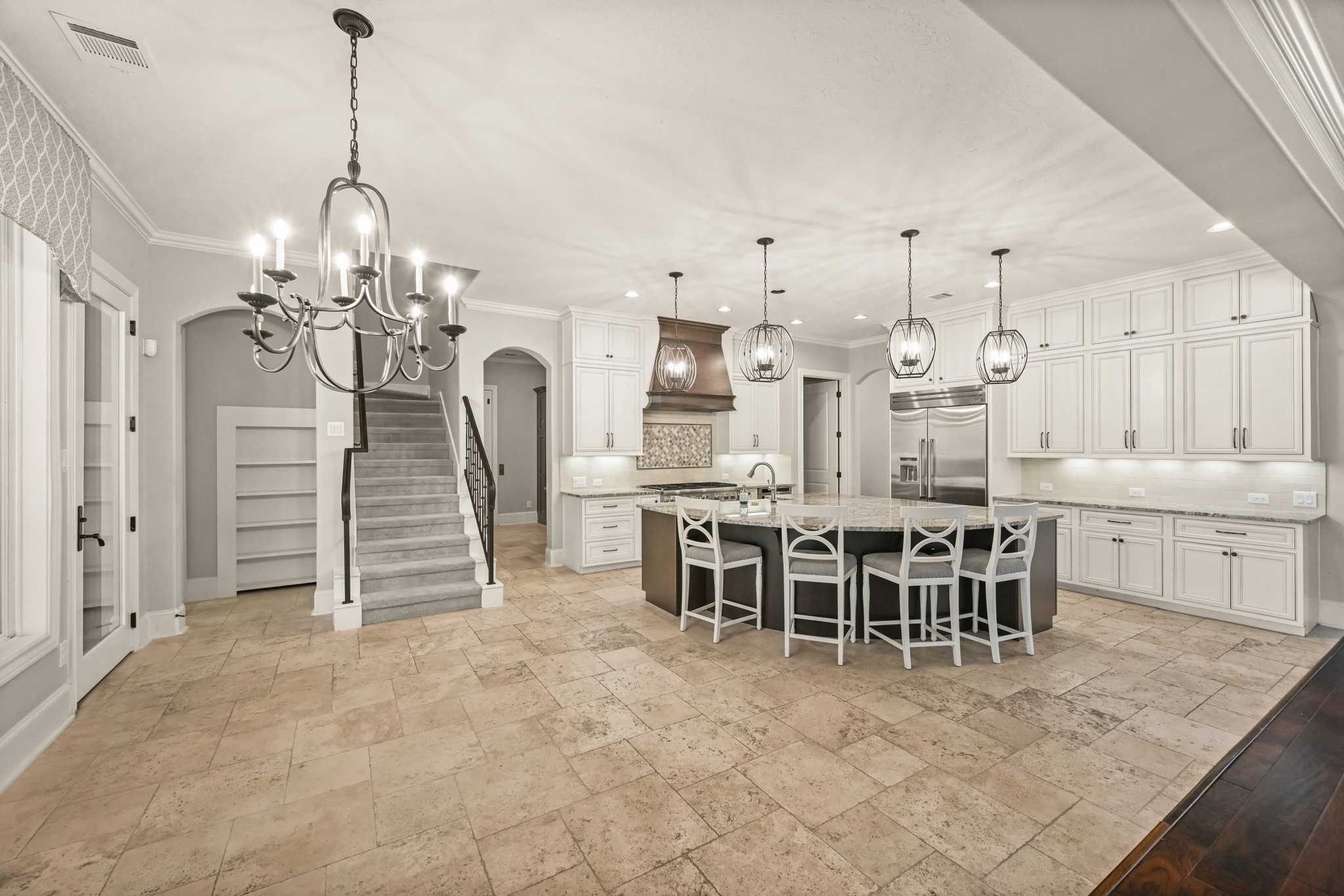 27322 Silver Jade Court Spring, TX 77386 - Photo 10 of 45 Kitchen and breakfast area feature a convenient second stairway and hidden under-stair storage.