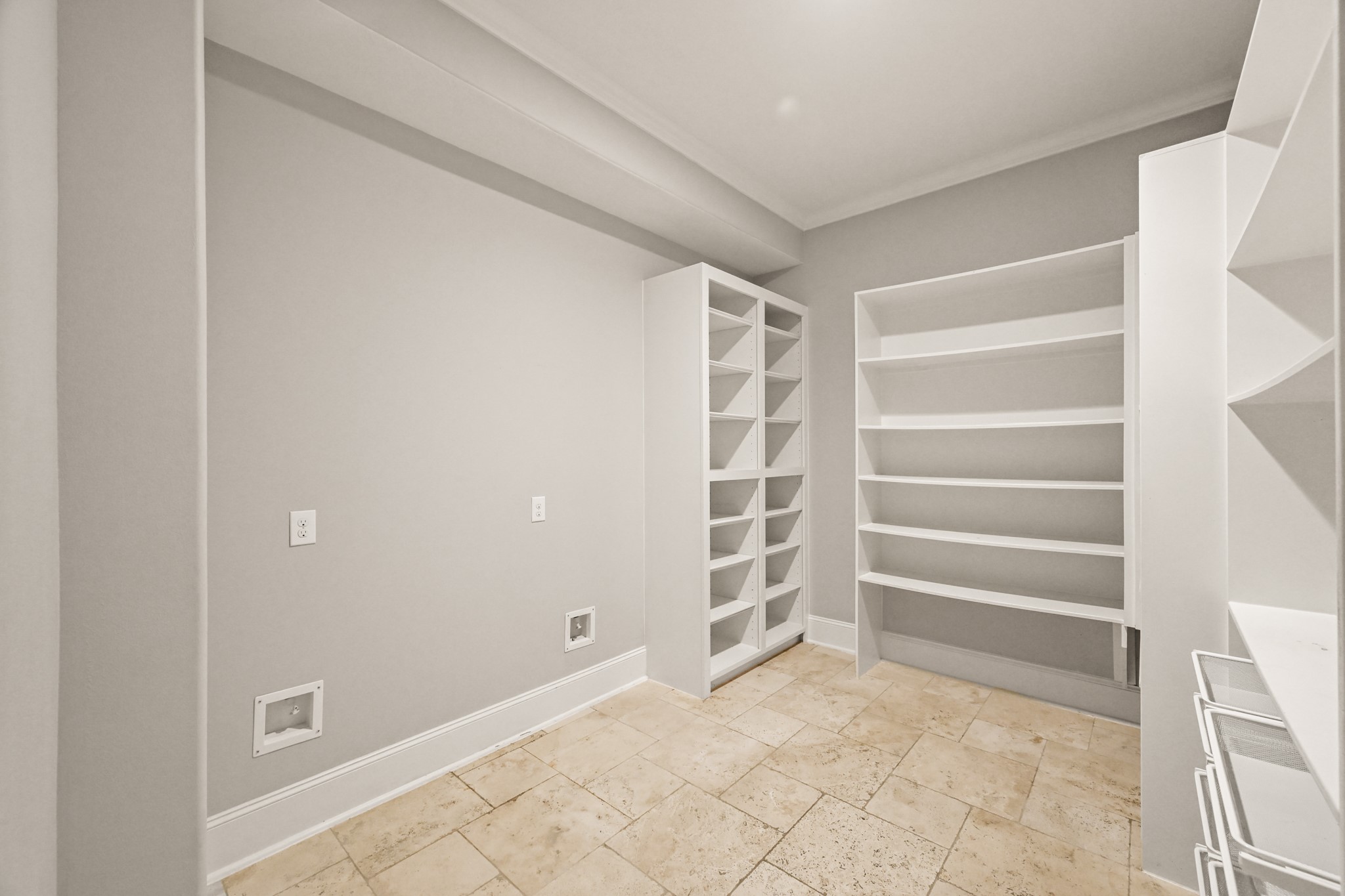 27322 Silver Jade Court Spring, TX 77386 - Photo 13 of 45 Oversized walk-in pantry—a true standout for any home chef or organizer. Thoughtfully planned, this pantry offers dedicated space for a full-size freezer and an additional refrigerator.