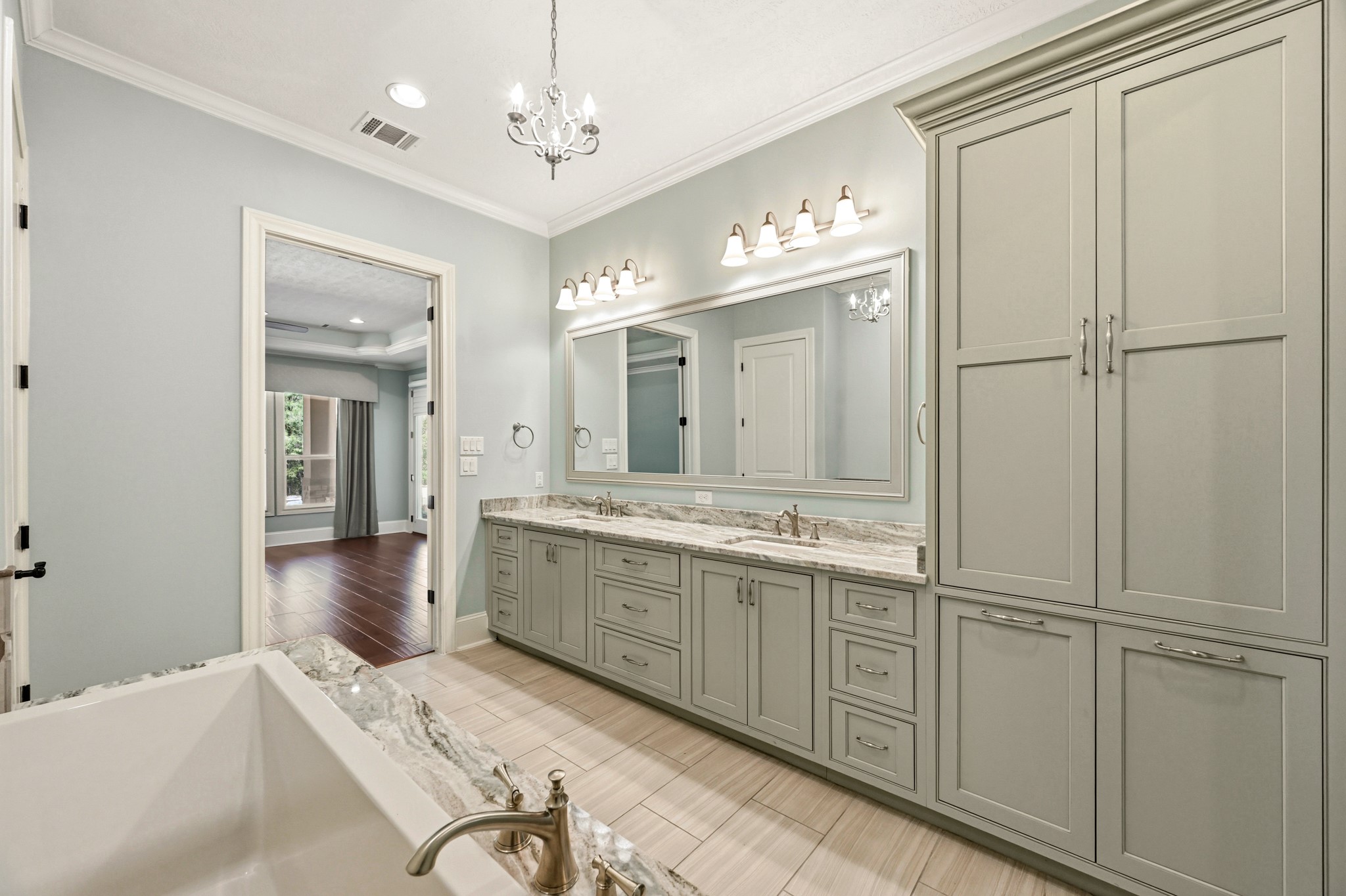 27322 Silver Jade Court Spring, TX 77386 - Photo 16 of 45 Primary bath features a double-sink vanity, walk-in shower, and relaxing soaker tub.