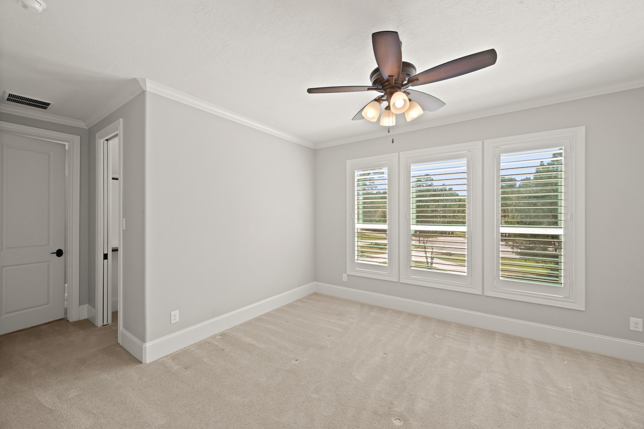 27322 Silver Jade Court Spring, TX 77386 - Photo 29 of 45 Three secondary bedrooms upstairs, ceiling fans and walk-in closets in all 3 bedrooms.