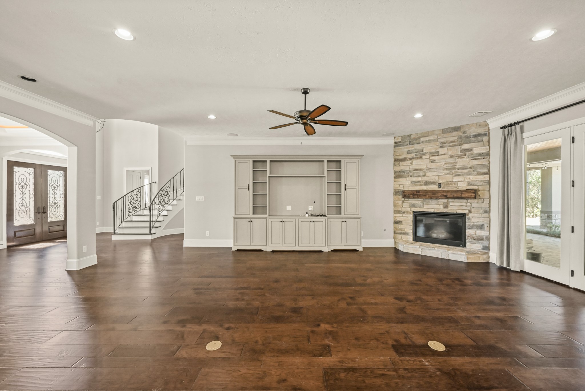 27322 Silver Jade Court Spring, TX 77386 - Photo 45 of 45 Open-concept entry flows seamlessly into the family room and kitchen for a spacious floor plan.