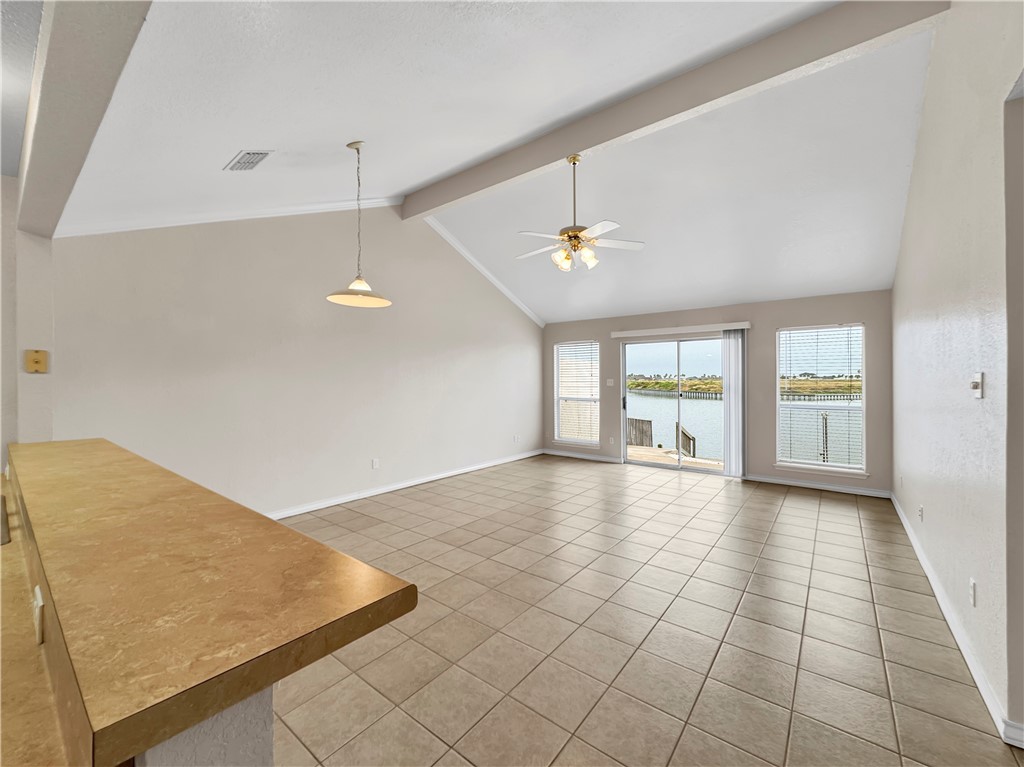 14302 Cruiser Street, Unit A Corpus Christi, TX 78418 - Photo 4 of 28 a view of an empty room and window
