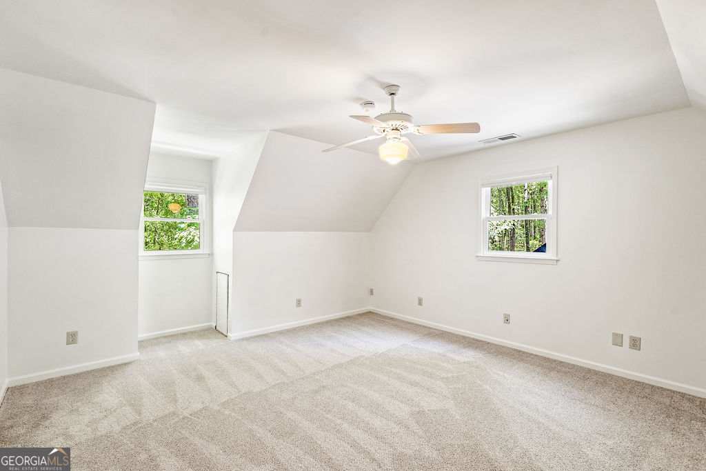 230 Haynes Road Moreland, GA 30259 - Photo 27 of 38 an empty room with windows and fan