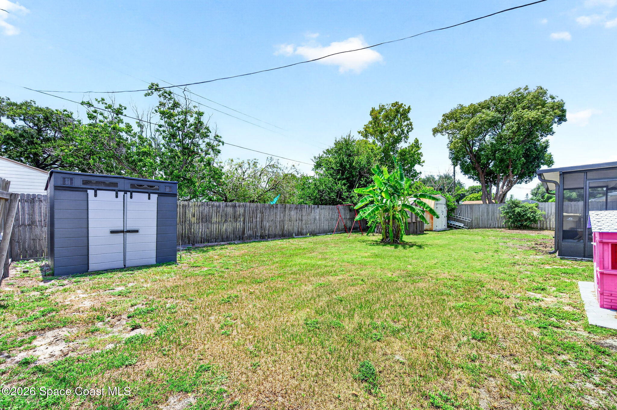 996 Botany Lane Rockledge, FL 32955 - Photo 33 of 35 a house view with a garden space