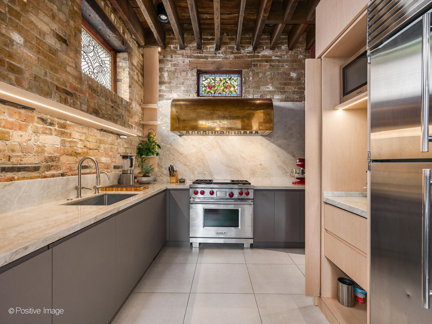 844 West Altgeld Street Chicago, IL 60614 - Photo 12 of 27 a kitchen with stainless steel appliances granite countertop a refrigerator and a sink