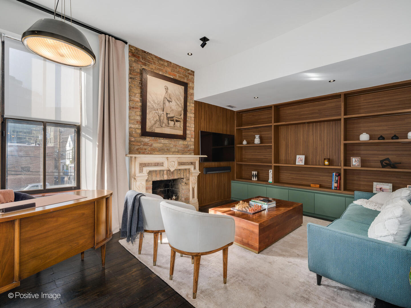 844 West Altgeld Street Chicago, IL 60614 - Photo 15 of 27 a living room with furniture a fireplace and a painting