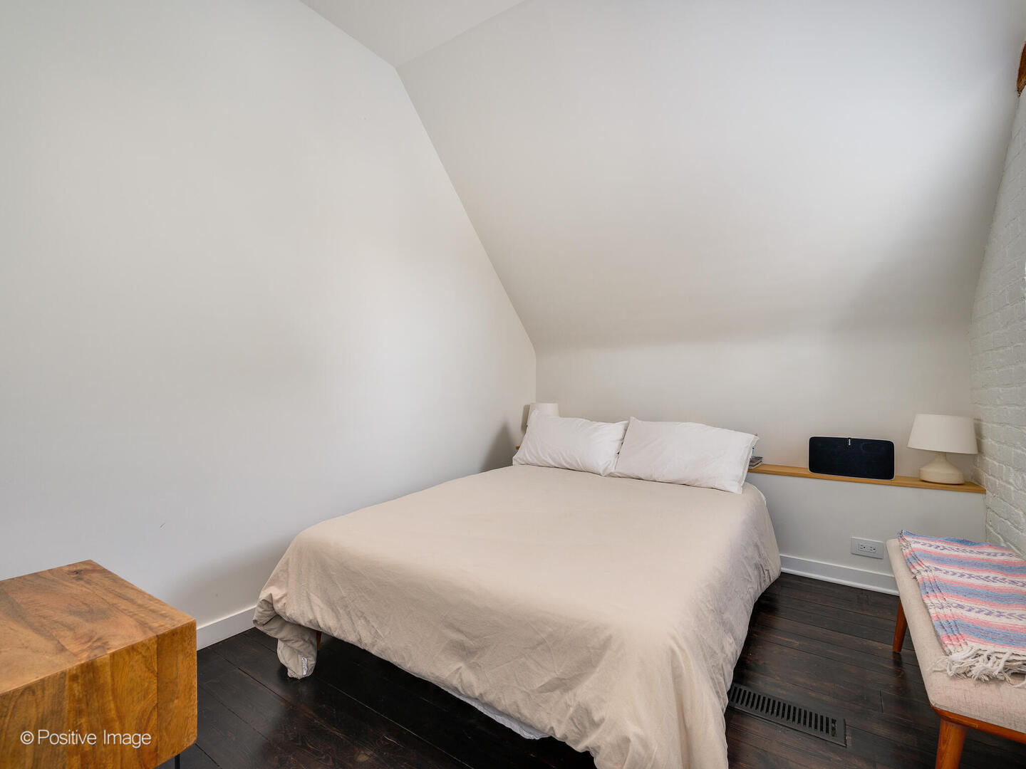 844 West Altgeld Street Chicago, IL 60614 - Photo 23 of 27 a bedroom with a bed and wooden floor