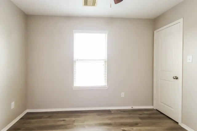 a view of a room that has a window