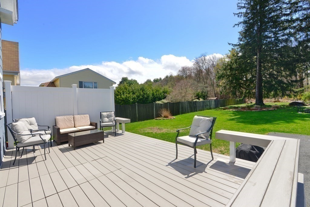 9 Ray Avenue Bellingham, MA 02019 - Photo 24 of 32 a view of a terrace with chairs