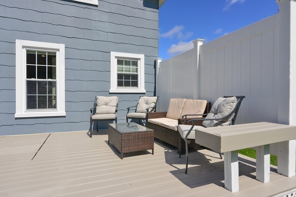 9 Ray Avenue Bellingham, MA 02019 - Photo 26 of 32 a building outdoor space with patio furniture