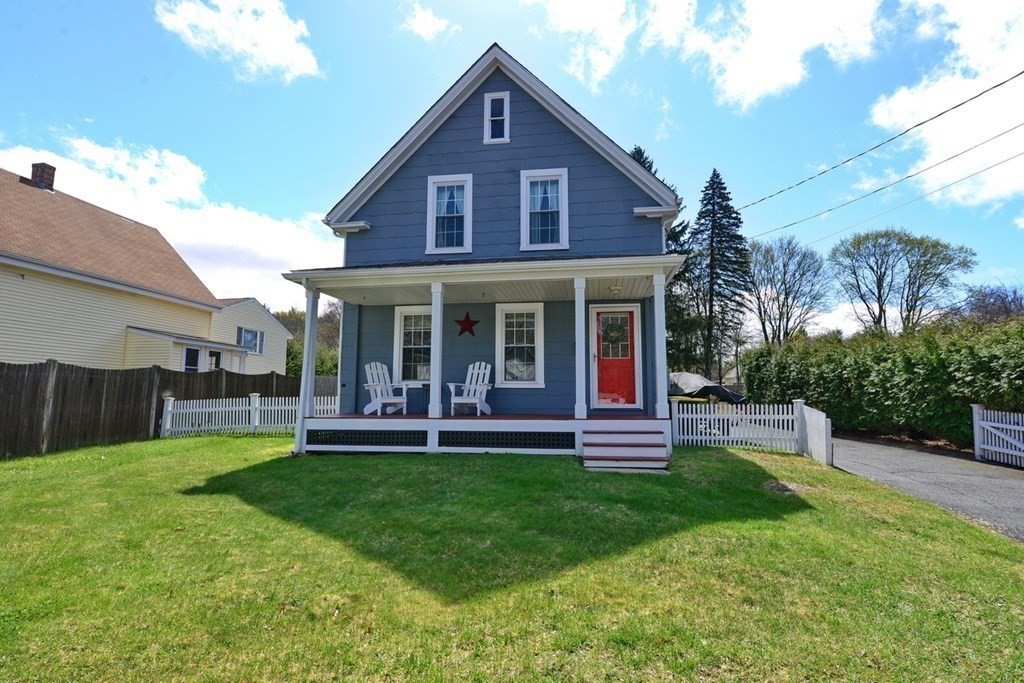 9 Ray Avenue Bellingham, MA 02019 - Photo 32 of 32 a front view of a house with a yard and porch