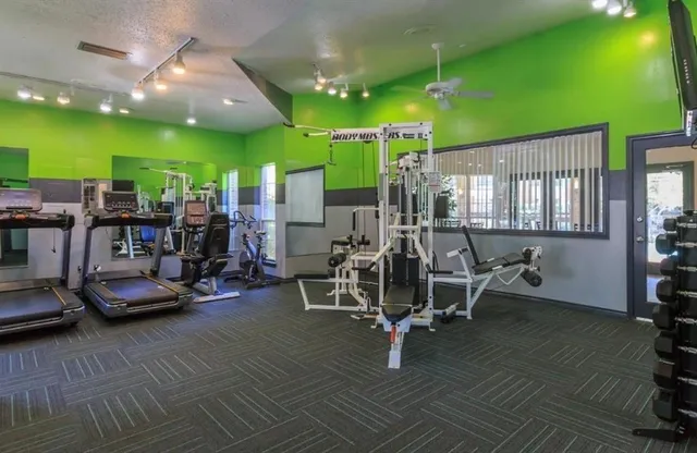 a view of a room with gym equipment