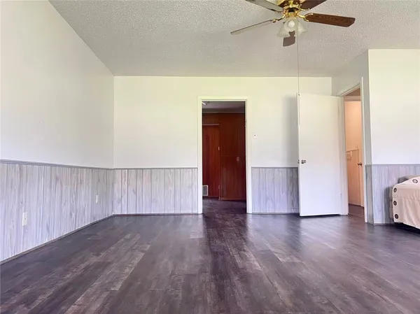 a kitchen with stainless steel appliances granite countertop a refrigerator sink and cabinets