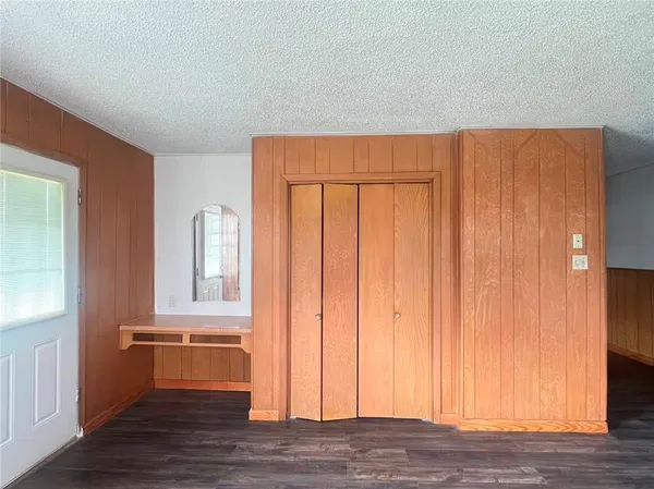 a kitchen with stainless steel appliances granite countertop a refrigerator sink and microwave