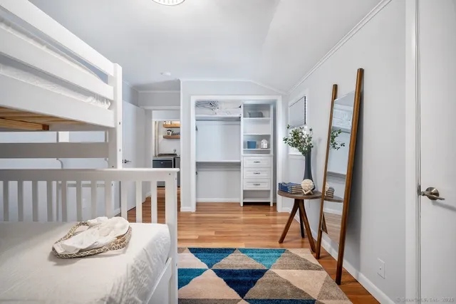 a living room with furniture and a rug