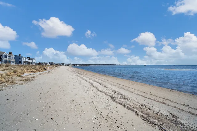 a view of beach and lake
