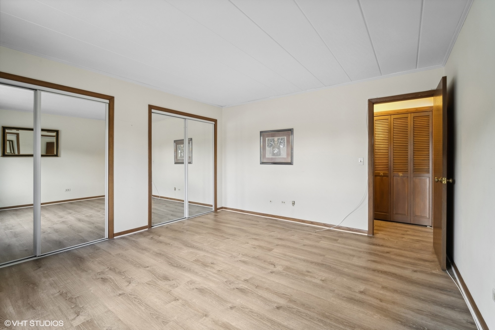 2 North Dee Road, Unit 103 Park Ridge, IL 60068 - Photo 20 of 30 a view of empty room with wooden floor
