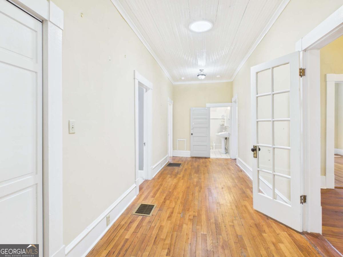 20 Simonton Bridge Road Watkinsville, GA 30677 - Photo 14 of 47 a view of a room with wooden floor and natural light