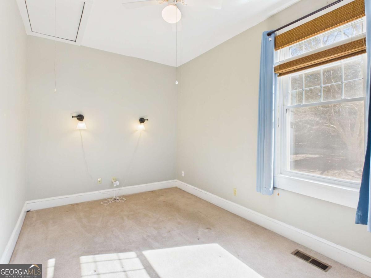 20 Simonton Bridge Road Watkinsville, GA 30677 - Photo 18 of 47 a view of a room that has a window