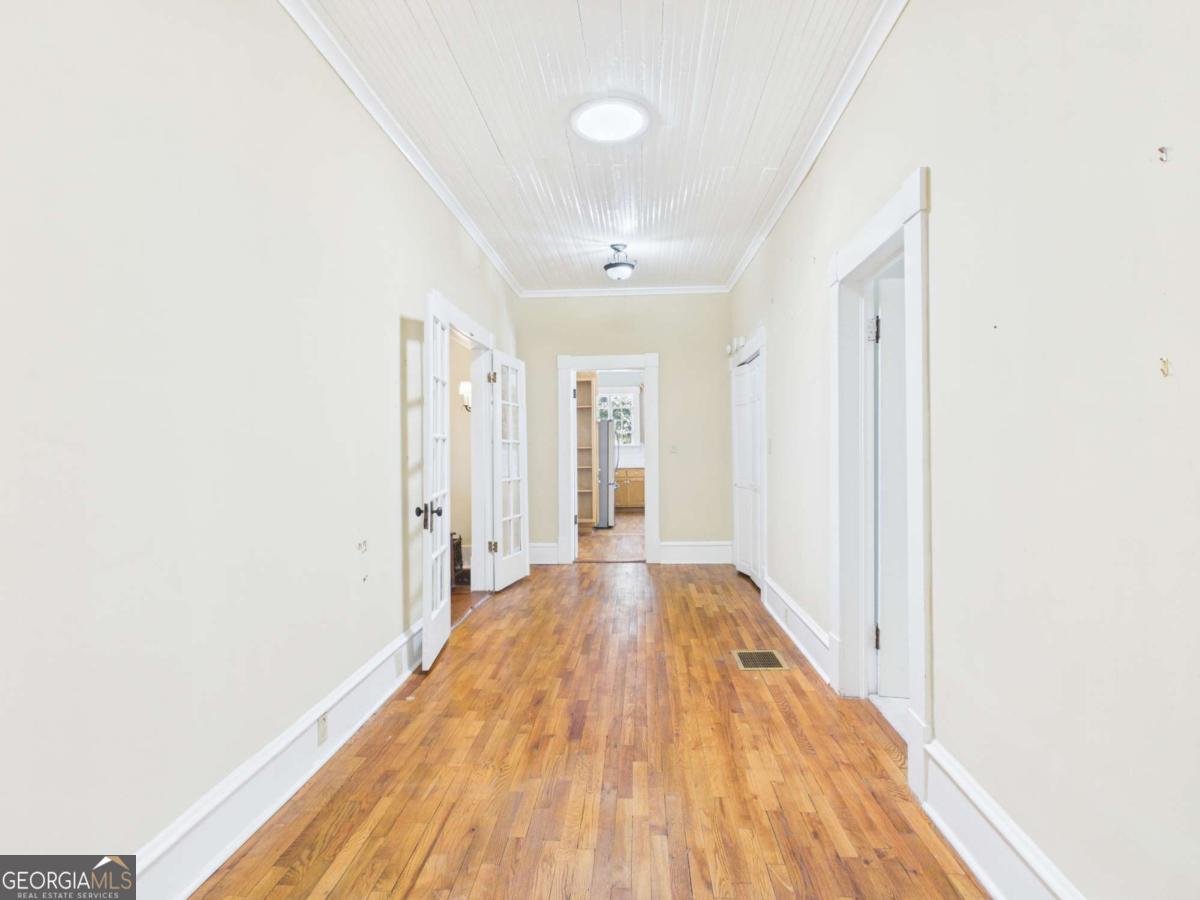 20 Simonton Bridge Road Watkinsville, GA 30677 - Photo 19 of 47 a view of a room with wooden floor