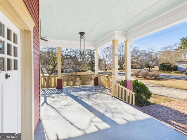 a living room with large windows