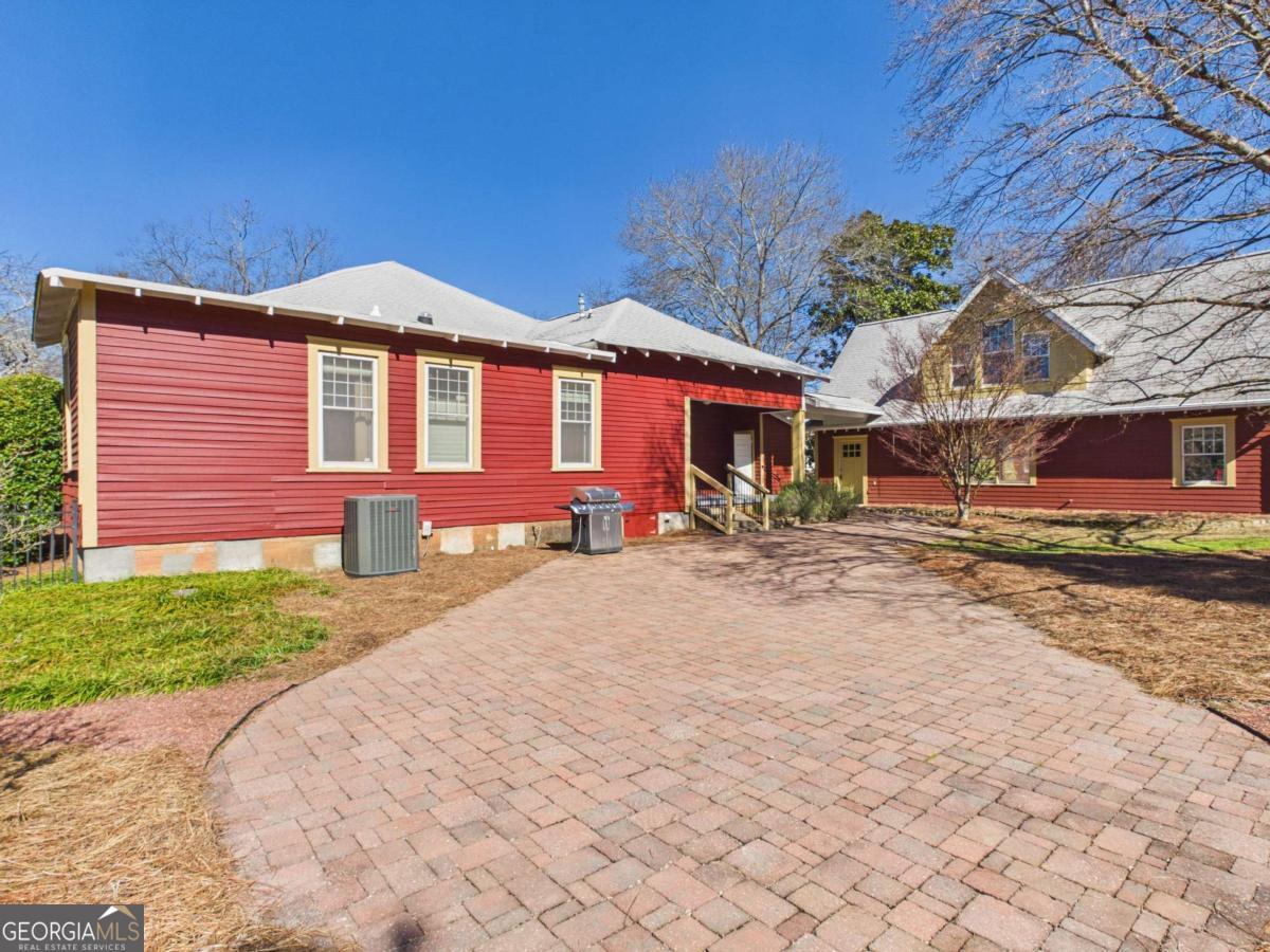 20 Simonton Bridge Road Watkinsville, GA 30677 - Photo 27 of 47 a front view of a house with a yard