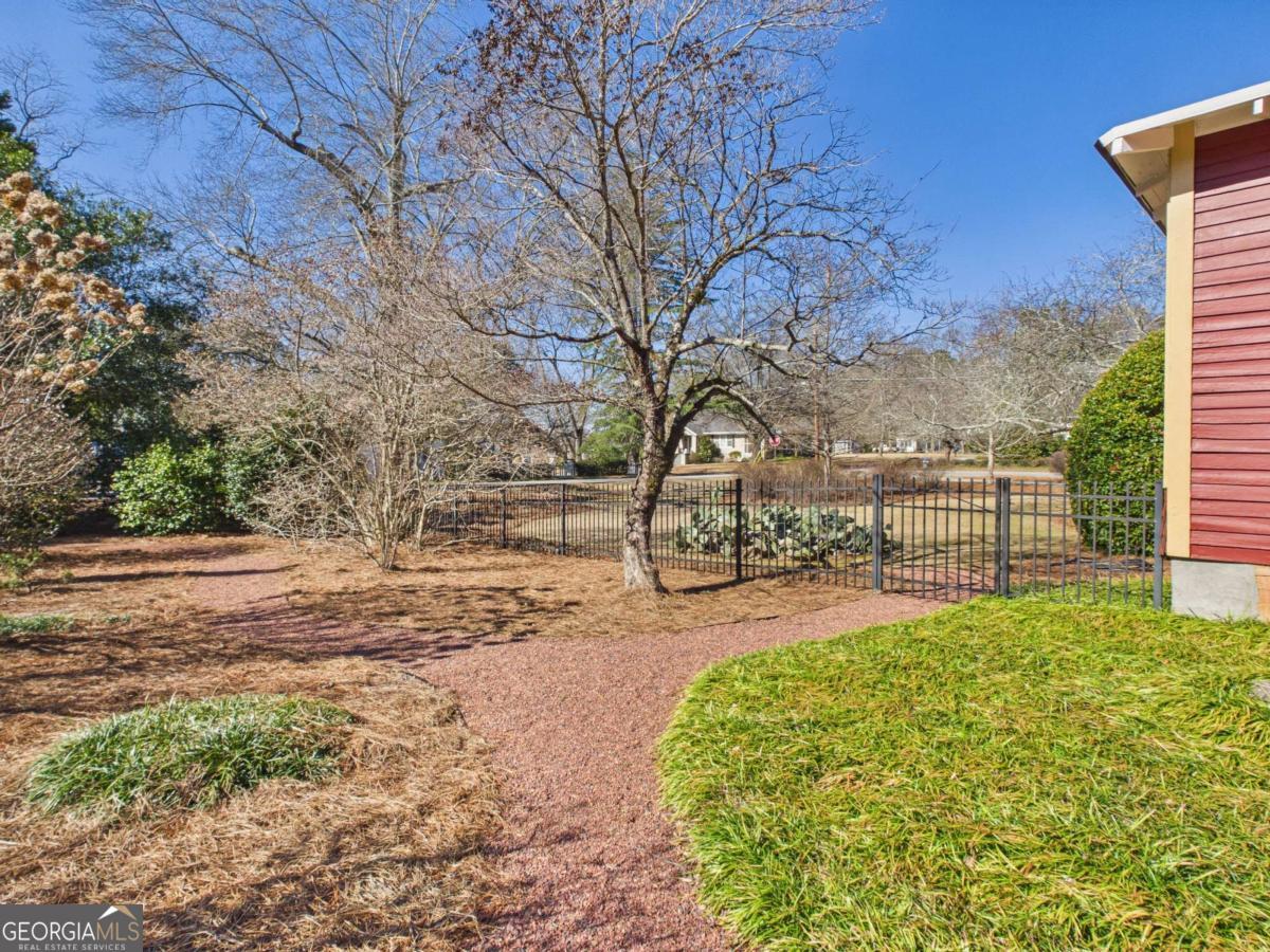 20 Simonton Bridge Road Watkinsville, GA 30677 - Photo 34 of 47 a view of a backyard with large trees