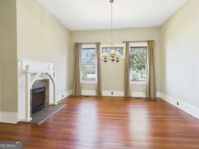 a view of livingroom with washer and dryer