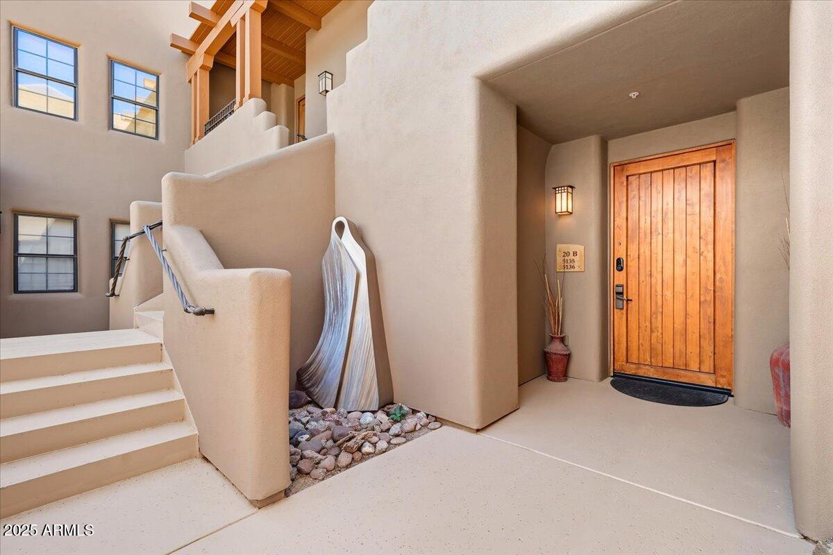 36601 North Mule Train Road, Unit B20 Carefree, AZ 85377 - Photo 2 of 27 a view of a closet with wooden floor and a window