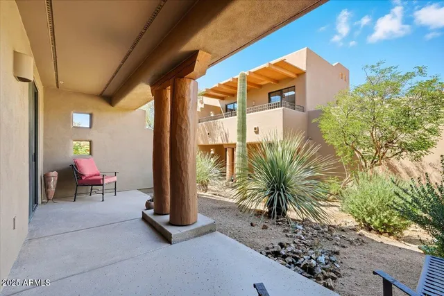 a potted plant sitting in front of a building