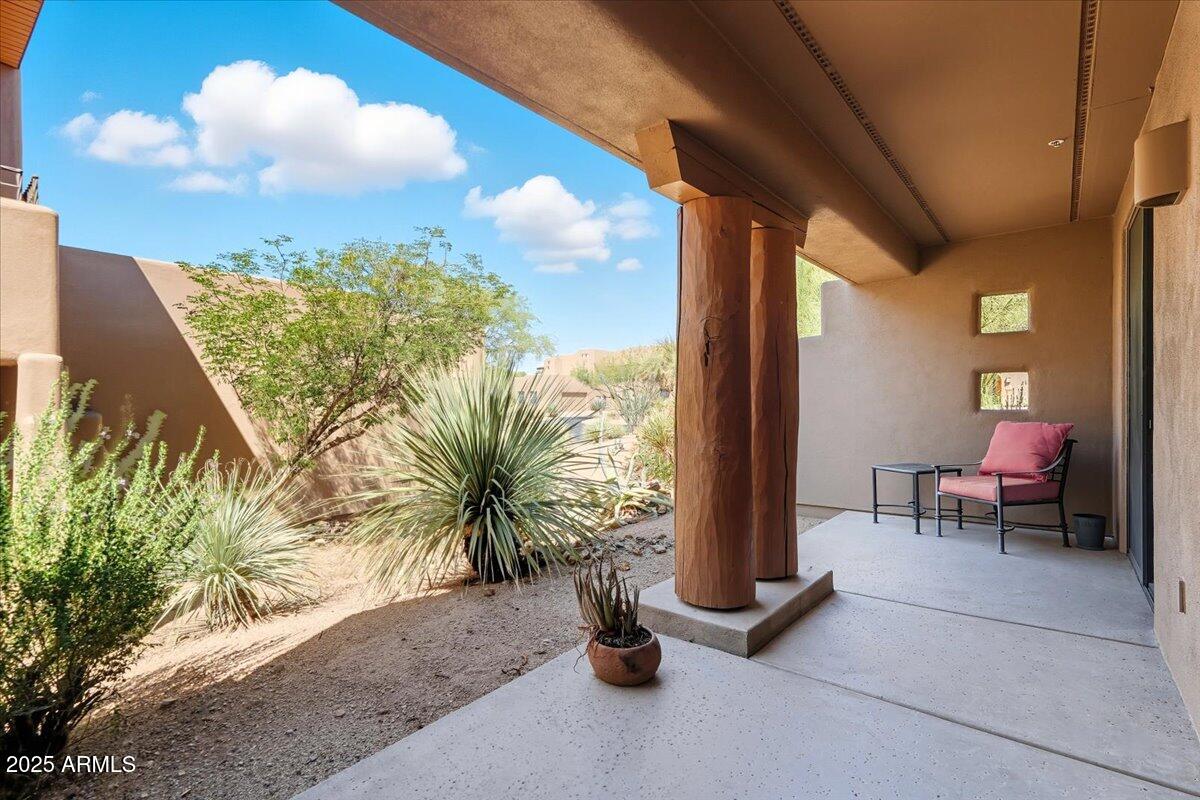 36601 North Mule Train Road, Unit B20 Carefree, AZ 85377 - Photo 26 of 27 a view of a floor with a table and chairs in patio