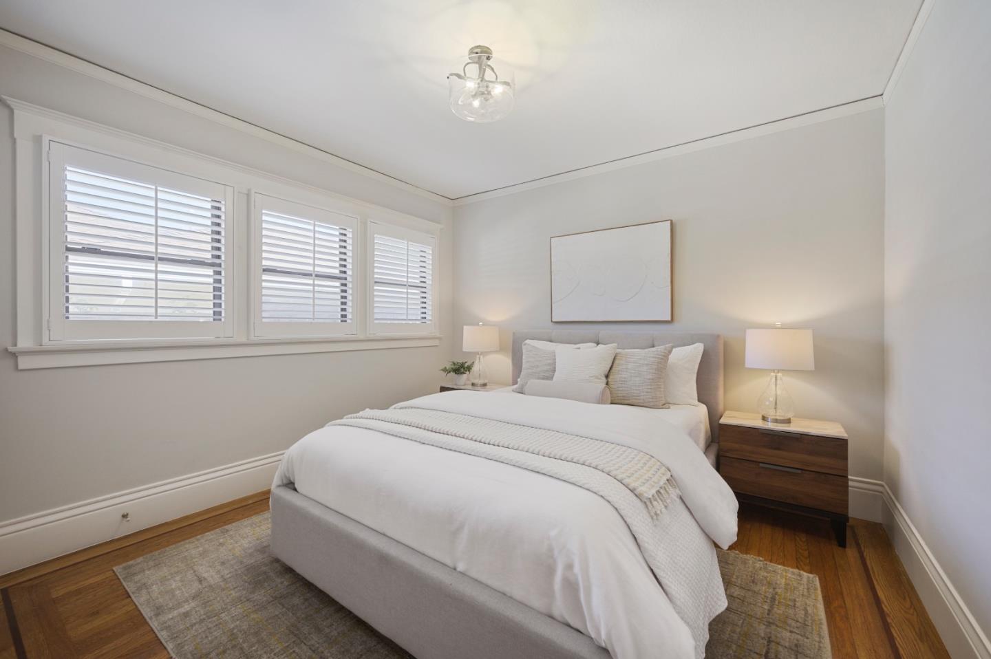 343 Warren Road San Mateo, CA 94402 - Photo 19 of 28 a bedroom with a bed and a window