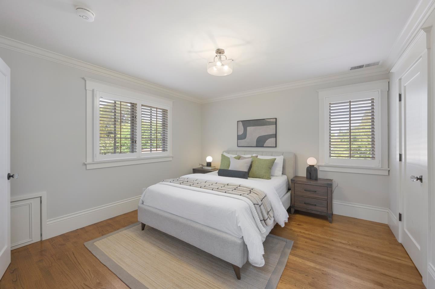 343 Warren Road San Mateo, CA 94402 - Photo 23 of 28 a bedroom with a bed and a window
