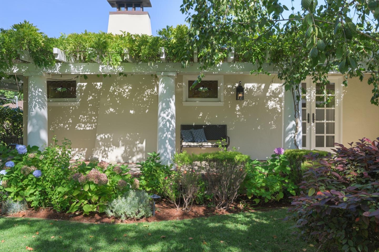 343 Warren Road San Mateo, CA 94402 - Photo 5 of 28 front view of a house with a yard and potted plants