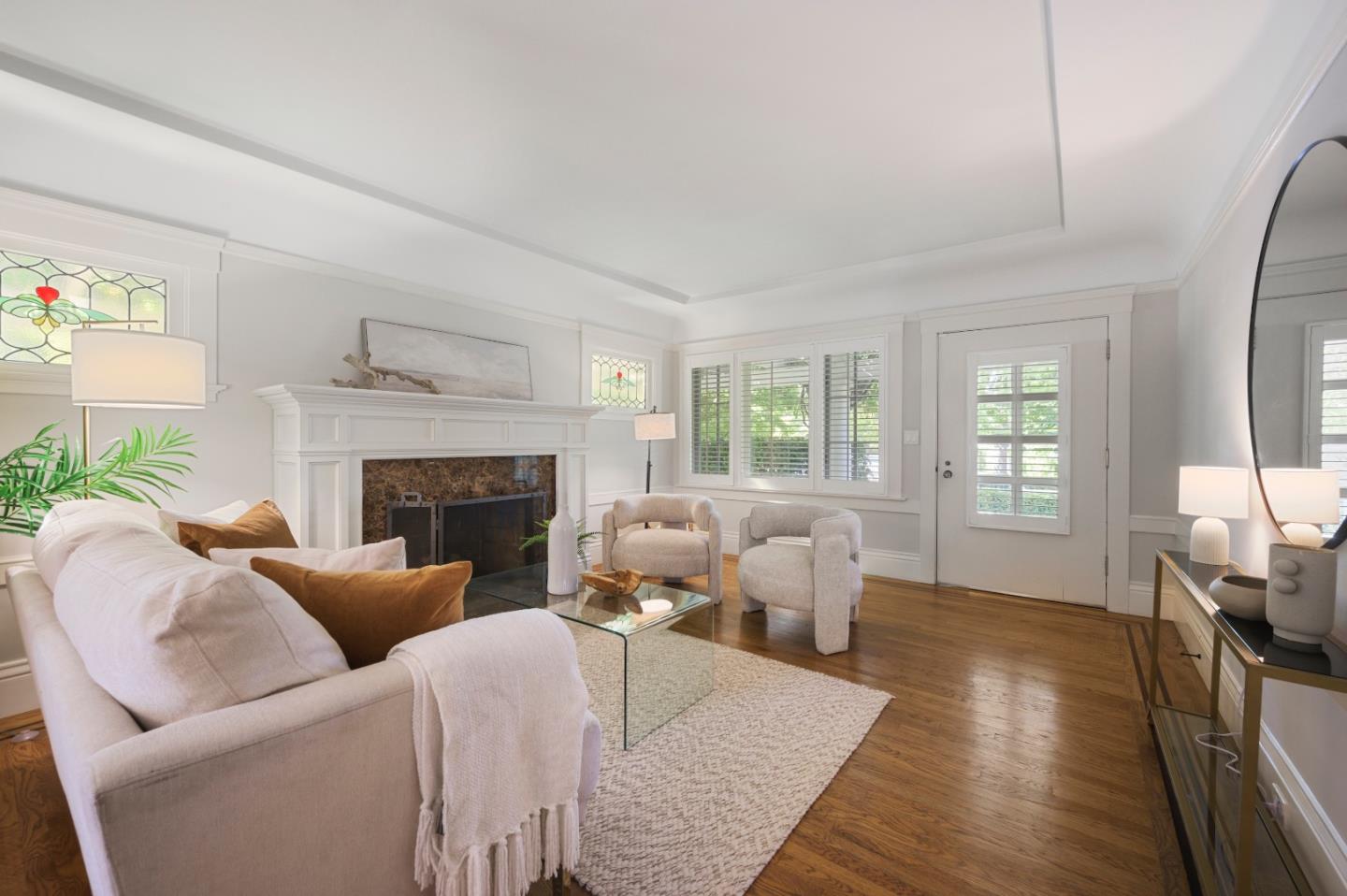 343 Warren Road San Mateo, CA 94402 - Photo 7 of 28 a living room with furniture and a fireplace