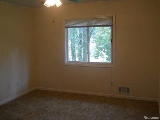 904 Ridge Court, Unit 123 Brighton, MI 48116 - Photo 15 of 23 master bedroom.jpg