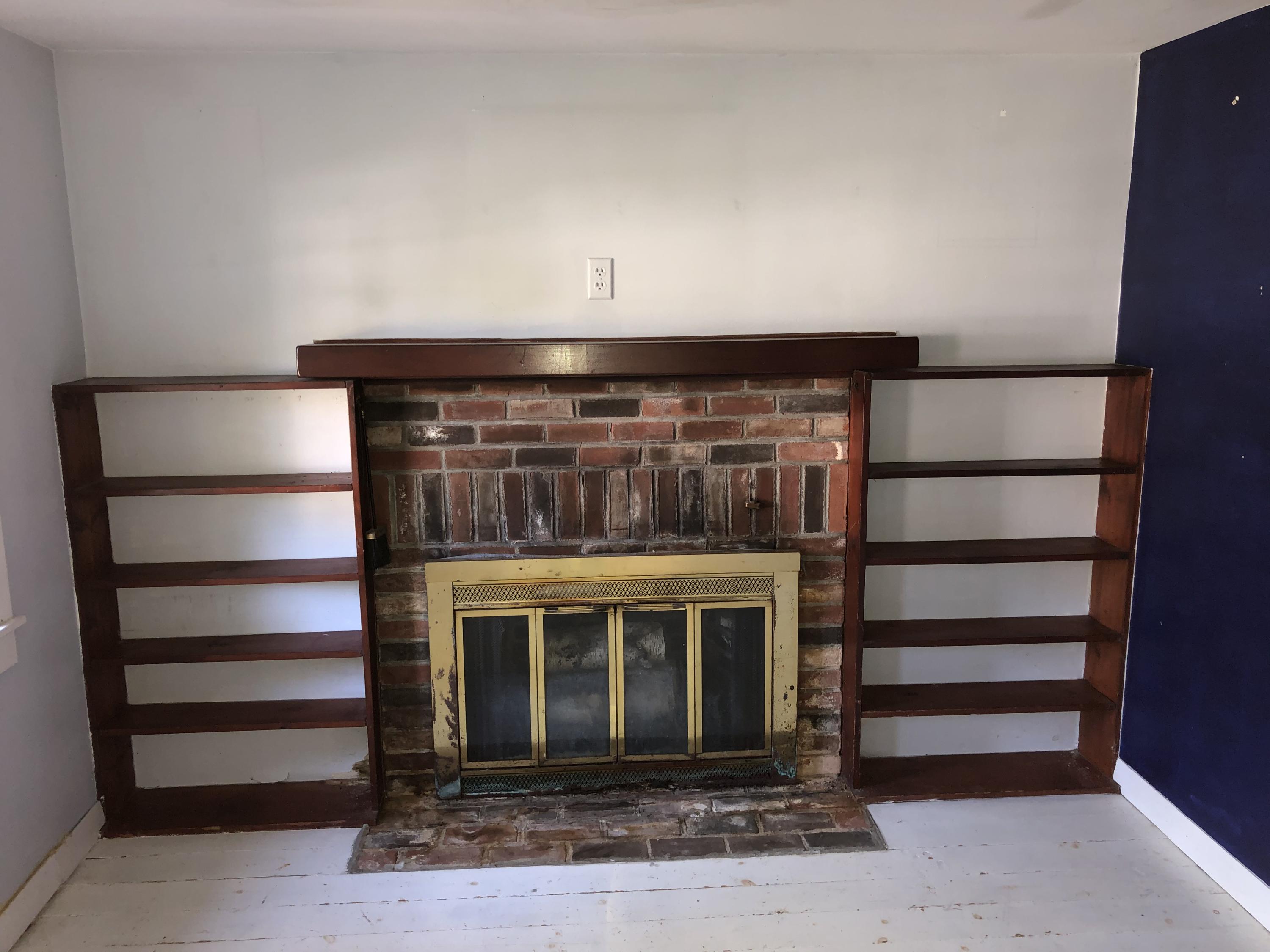 23 Kendrick Road Harwich, MA 02645 - Photo 7 of 13 a living room with a fireplace