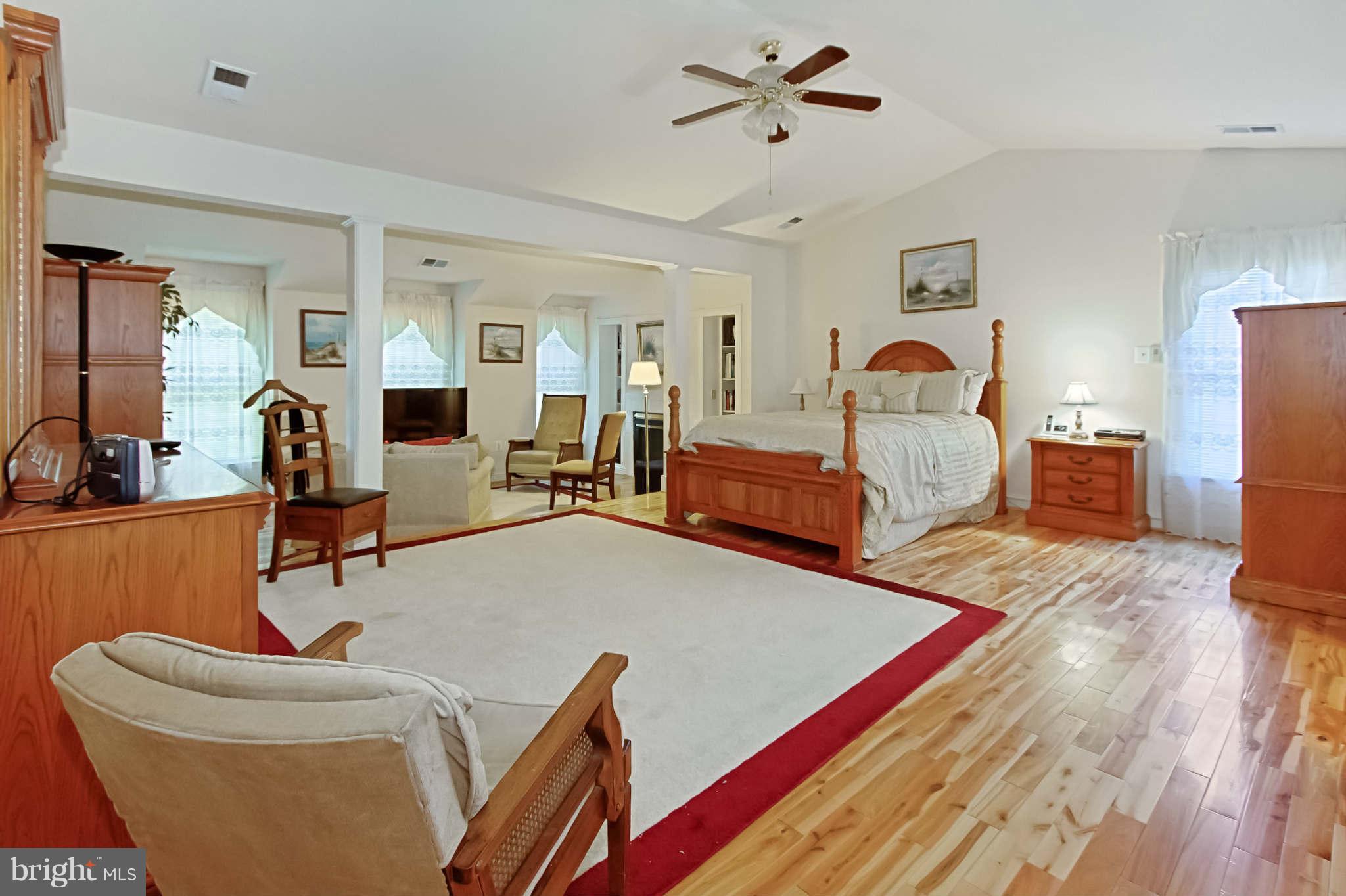 8635 Tuttle Road, Unit 2 Springfield, VA 22152 - Photo 16 of 30 a living room with furniture and wooden floor