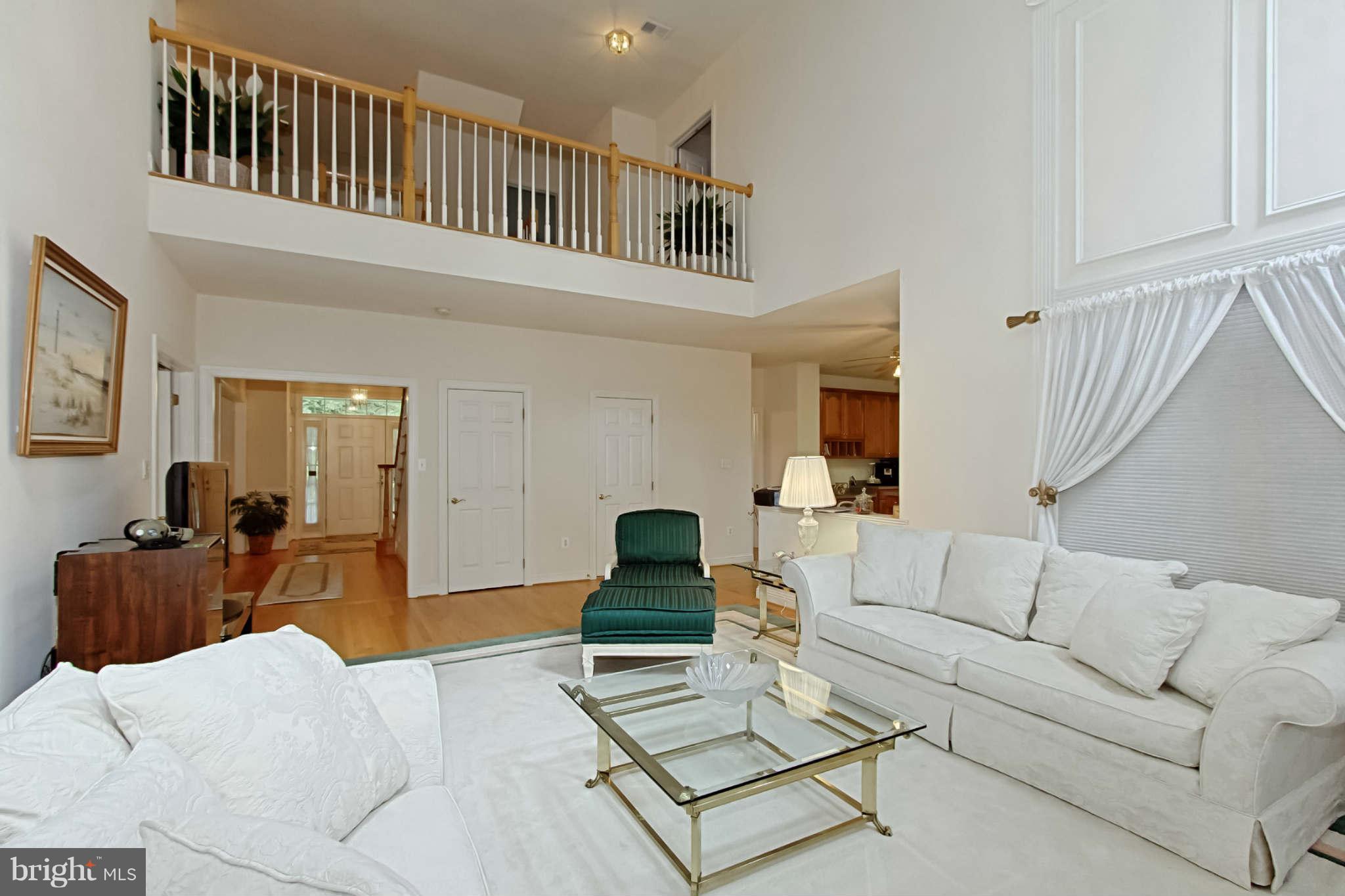 8635 Tuttle Road, Unit 2 Springfield, VA 22152 - Photo 9 of 30 a living room with furniture