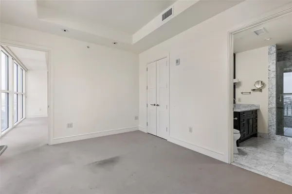 an empty room with windows