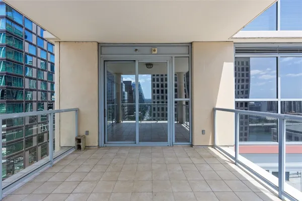 a view of a balcony with city view